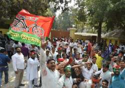 Samajwadi party workers celebrate their party success in Phulpur by-election, in Lucknow 