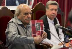 Pakistan Human Rights officials display report in Islamabad.