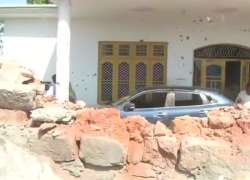 Houses and cars damaged after heavy shelling from Pakistan in RS Pura sector