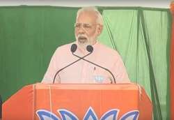 PM Modi addressing a public meeting in Karnataka's Koppal on Tuesday