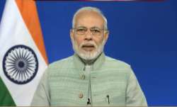 Prime Minister Narendra Modi interacts with farmers via video conferencing. 