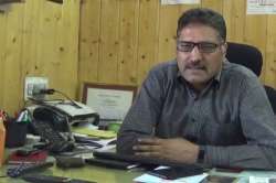 Rising Kashmir editor-in-chief Shujaat Bukhari