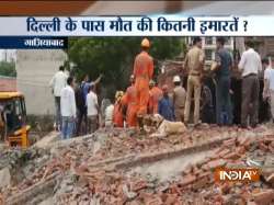 NDRF team is trying to rescue the trapped people from the debris