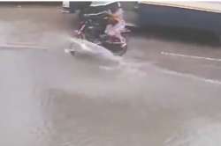 On CCTV: Woman falls off bike after hitting pothole, dies 