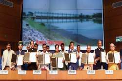 Union Minister for Road Transport & Highways, Shipping and Water Resources, River Development & Ganga Rejuvenation Nitin Gadkari at the signing ceremony of MoU between MoWR and Chief Ministers of six states viz Uttar Pradesh, Delhi, Uttarakhand, Rajasthan, Himachal Pradesh and Haryana regarding the Lakhwar Dam Project.