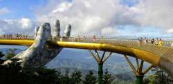 Pair of giant hands holding world's most impressive pedestrian bridge in Vietnam