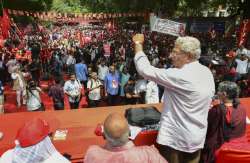 New Delhi: CPI(M) general secretary Sitaram Yechury (R) speaks during 'Mazdoor Kisan Sangharsh Rally' organised by workers and farmers from various unions at Parliament Street