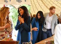 rince Harry sneaks out samosas from Meghan Markle’s cookbook event