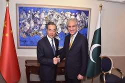 China's Foreign Minister Wang Yi with his Pak counterpart Shah Mahmood Qureshi.