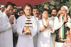 Rahul Gandhi, flanked by PCC chief Kamal Nath and MP Jyotiraditya Scindia