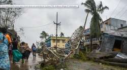 A damaged mobile tower seen struck down on road due to Cyclone Titli, at Barua village of Srikakulam
?