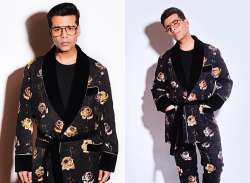 Karan Johar describes his fashion choices to designer friend Manish Malhotra