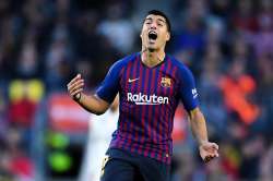 With Lionel Messi out, Luis Suarez takes leadership role for Barcelona