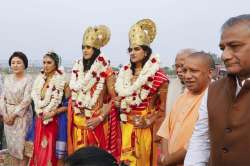 Kim Jung-Sook, third left, wife of South Korean President Moon Jae-in, poses with artists dressed as Lakshman, Ram and Sita during Diwali celebrations in Ayodhya. UP CM Yogi Adityanath, Union Minister VK Singh also attended the event. (Photo/PTI)