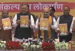 Amit Shah, Raman Singh  release BJP manifesto 