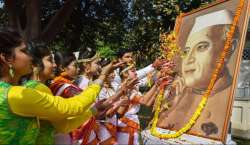 Students pay floral tribute to Pt. Jawaharlal Nehru on his 129th birth anniversary, celebrated as Children's Day (Bal Diwas), at the historic Anand Bhawan in Allahabad