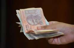 The rupee opened lower at 70.88 per dollar against and dropped further to quote at 70.89, 10 paise down over its previous close.