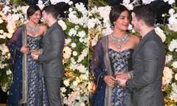 PHOTOS: Priyanka Chopra looks regal in Sabyasachi gown while Nick Jonas can’t keep eyes off his bride