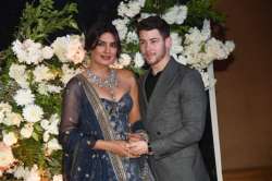 Priyanka Chopra blushes as she introduces husband Nick Jonas to her guests at reception