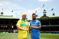 The two captains pose with the ODI series trophy.