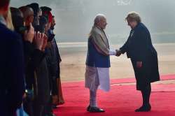 Prime Minister Narendra Modi greets his Norwegian counterpart Erna Solberg during her ceremonial reception at Rashtrapati Bhawan, in New Delhi.