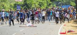  
BJP workers hurls bricks and stones at the CPI office following their protest against the entry of two women of menstruating age into the Sabarimala temple of Lord Ayyappa, in Palakkad, Kerala