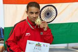 Sports Minister felicitates boxers Amit Panghal, Manish Kaushik with cash awards