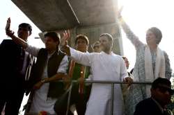 Jyotiraditya Scindia, Rahul Gandhi and Priyanka Gandhi Vadra during roadshow in Lucknow