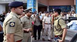 Kolkata Police Commissioner Rajeev Kumar (R) at Eden Gardens in Kolkata