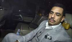 ?
?
Businessman Robert Vadra leaves after appearing before Enforcement Directorate (ED) for interrogation in a money laundering case