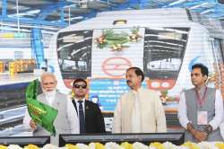 Prime Minister Narendra Modi flags off the Noida City Centre - Noida Electronic City Section of the Metro, at Greater Noida