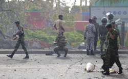 Sri Lankan security forces near St. Anthony's shrine after an explosion took place in a vehicle parked outside the church in Colombo.