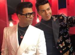 Karan Johar unveils his wax statue at Madame Tussauds Singapore with mother Hiroo Johar