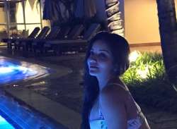 Ex Bigg Boss contestant Monalisa turns heads in white swimsuit