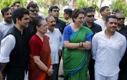  Congress party leader Sonia Gandhi, second left, stands with her daughter and party General Secretary Priyanka Vadra, her son-in-law Robert Vadra and grandson Raihan Vadra after filing her nomination papers for the upcoming general elections in Rae Bareli.