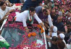 Ghaziabad: Congress General Secretary Priyanka Vadra being blessed by a muslim during a roadshow, ah