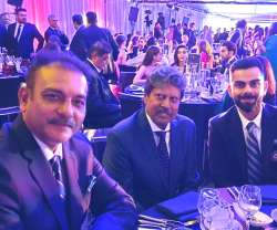 Ravi Shastri with Kapil Dev and Virat Kohli.