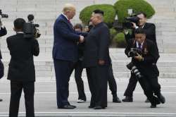 President Donald Trump walks to the North Korean side of the border with North Korean leader Kim Jong Un at the border village of Panmunjom in the Demilitarized Zone, South Korea.