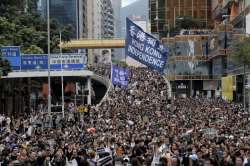 Hong Kong radical protesters throw petrol bombs