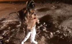 'Astronaut' doing the moonwalk on Bengaluru potholes