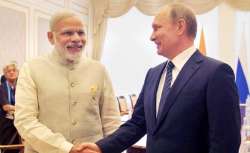 Putin by his side, Modi slams 'outside influence' in internal matters