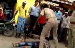 WATCH | UP cops thrash, drag man for alleged traffic violation as terrified child looks on