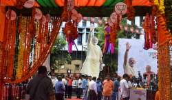 Party workers gather outside BJP office in Mumbai. 