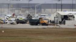 With 13 onboard, World War II-era bomber crashes and burns at Hartford airport in aborted takeoff