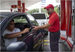 Venezuelans buy gas with cigarettes to battle inflation