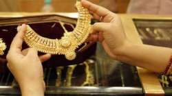 Gold rises ? 118 on global cues, rupee depreciation