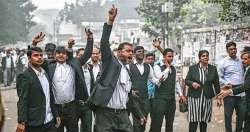 Police resume work at Tis Hazari court after 2 weeks, lawyers continue strike