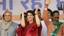 Jharkhand Mukti Morcha leader Hemant Soren, right, with the Congress's Priyanka Gandhi Vadra and Chhattisgarh Chief Minister Bhupesh Baghel at an election rally in Pakur, Jharkhand, on December 18, 2019.