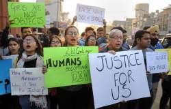 Women protesting against the increasing atrocities