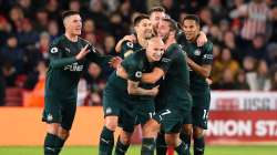 Jonjo Shelvey (C) of Newcastle celebrates with his team mates after he scores the 2nd goal during the Premier League match between Sheffield United and Newcastle United at Bramall Lane on December 05